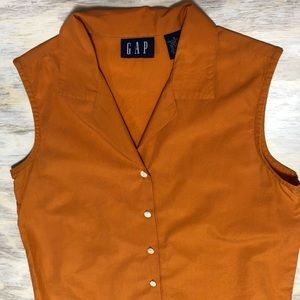 Lovely rust-orange button down sleeveless top from the Gap